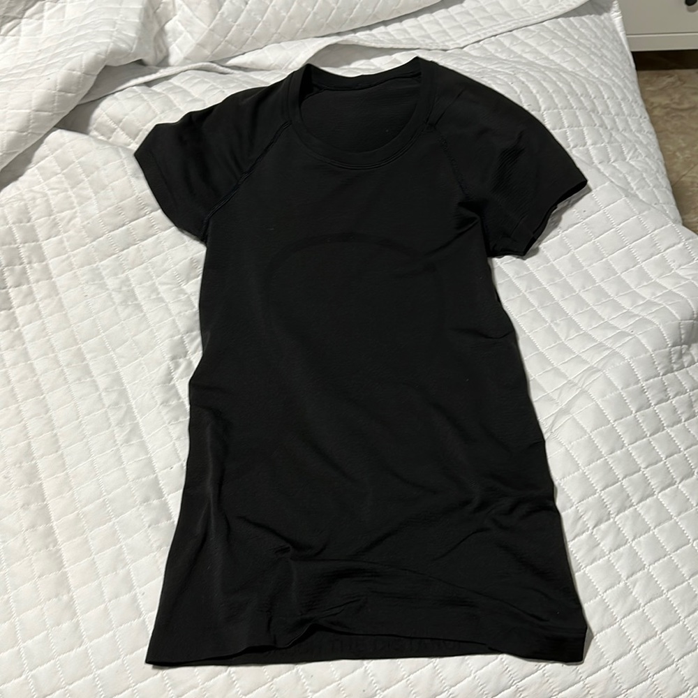 black swiftly tee size 4